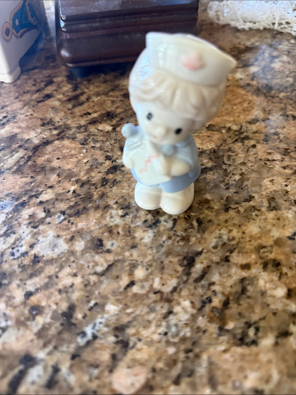Porcelain Nurse Figurine in Cream and Light Blue